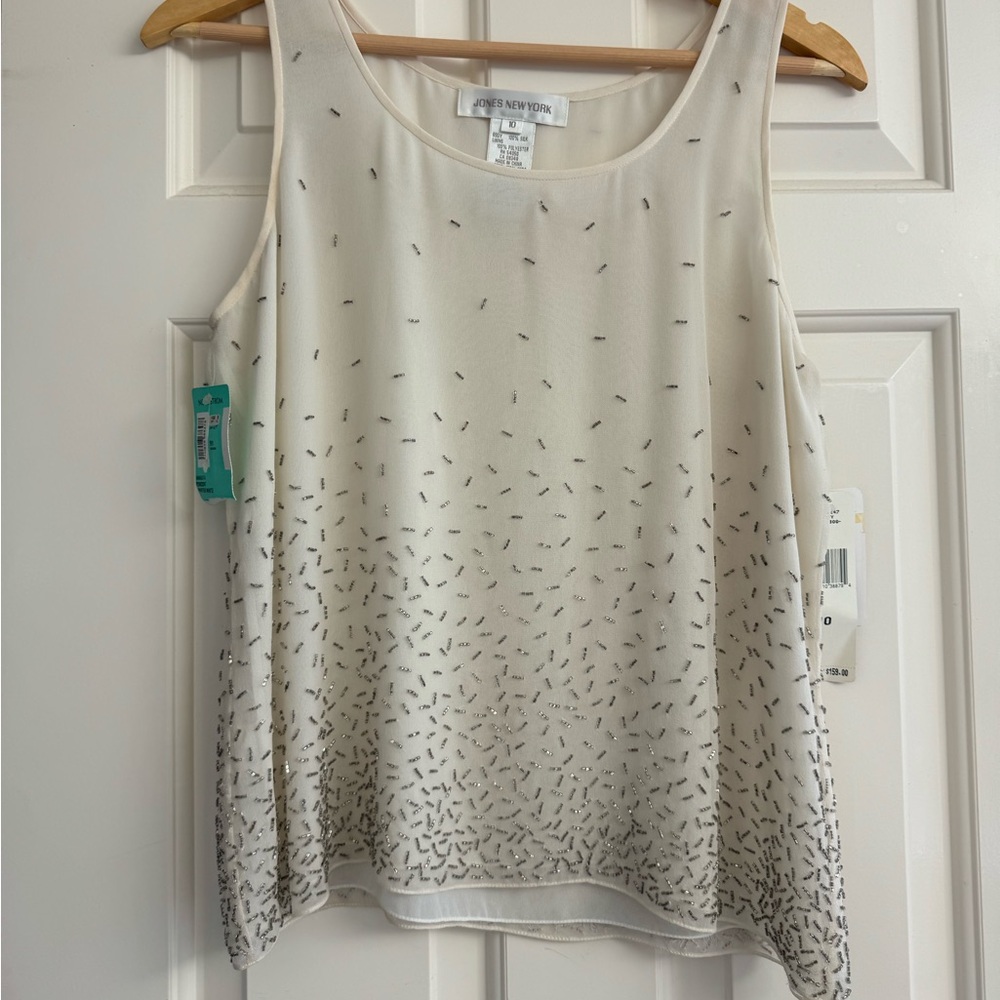 100% silk tank top with beaded details by Jones New York. Off-white, size 10.